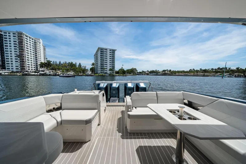 Slide: The Image of Luxury seating on 2025 Formula 500 Super Sport Crossover yacht, with waterfront view. - 21