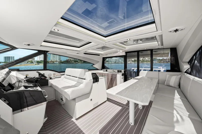 Slide: The Image of Luxurious interior of 2025 Formula 500 Super Sport Crossover yacht with panoramic windows. - 29