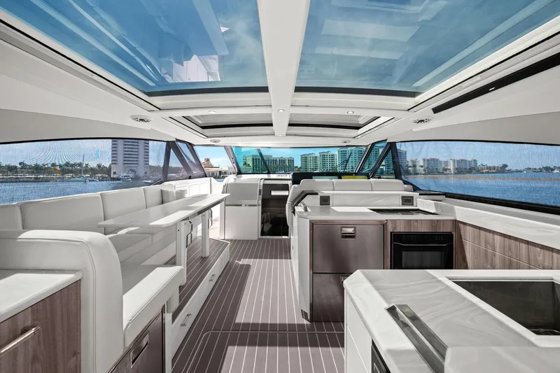 Slide: The Image of Luxurious interior of 2025 Formula 500 Super Sport Crossover yacht with panoramic windows. - 30