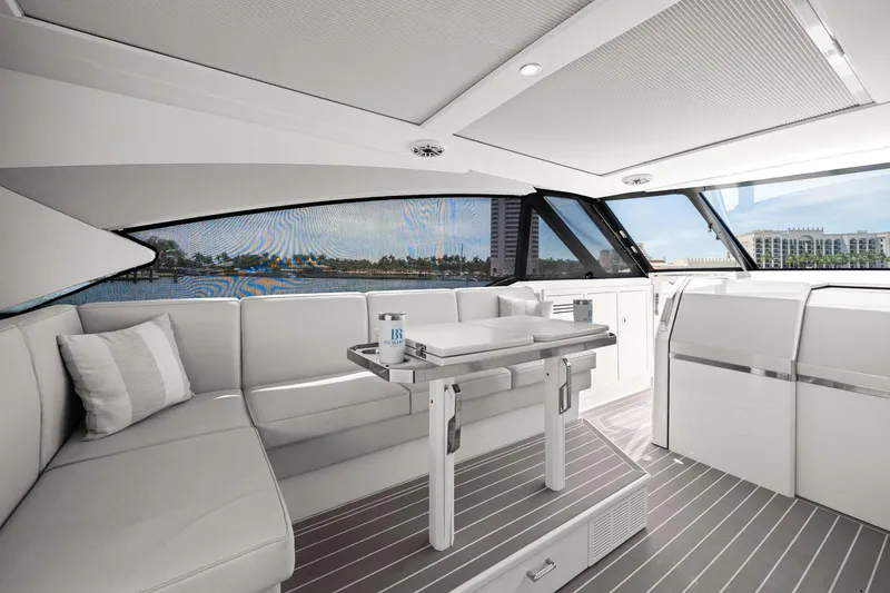 Slide: The Image of Luxurious interior of 2025 Formula 500 Super Sport Crossover yacht with sleek seating and table. - 35