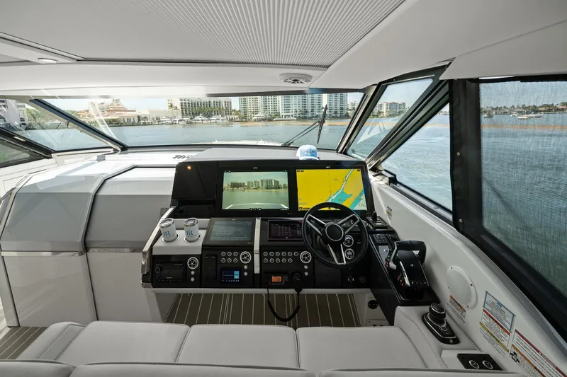 Slide: The Image of Interior cockpit of 2025 Formula 500 Super Sport Crossover yacht with advanced navigation system. - 39