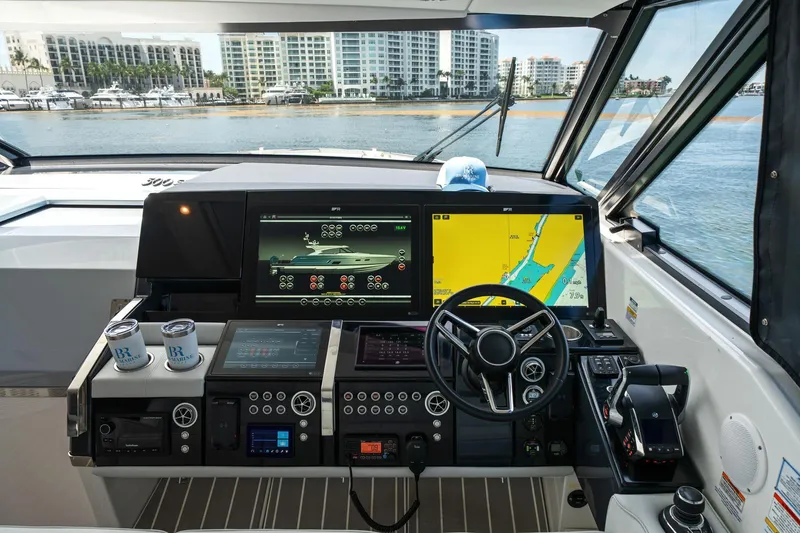 Slide: The Image of 2025 Formula 500 Super Sport Crossover helm with advanced navigation displays and controls. - 40