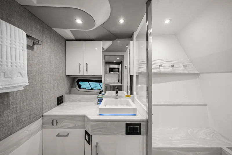 Slide: The Image of Luxurious interior of 2025 Formula 500 Super Sport Crossover yacht bathroom, featuring modern design and amenities. - 47
