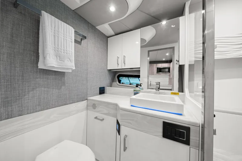 Slide: The Image of Luxurious bathroom interior of 2025 Formula 500 Super Sport Crossover yacht, featuring modern fixtures. - 50