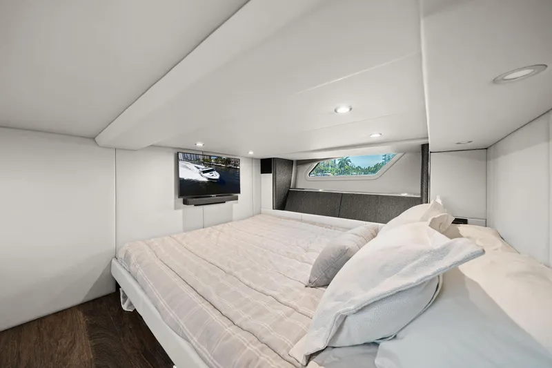 Slide: The Image of Luxurious cabin interior of 2025 Formula 500 Super Sport Crossover with bed and TV. - 52