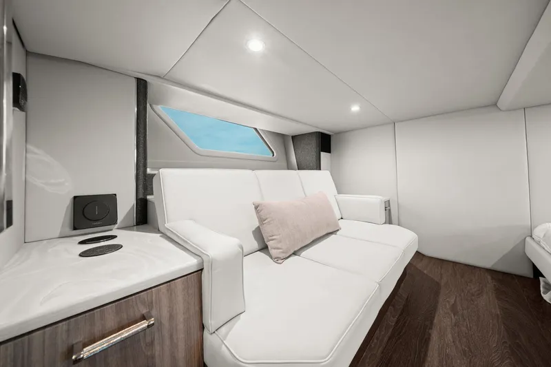 Slide: The Image of Luxurious interior of 2025 Formula 500 Super Sport Crossover with sleek white seating. - 53