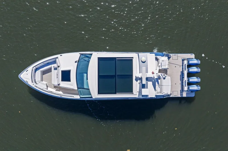 Slide: The Image of Aerial view of 2025 Formula 500 Super Sport Crossover boat on water. - 65