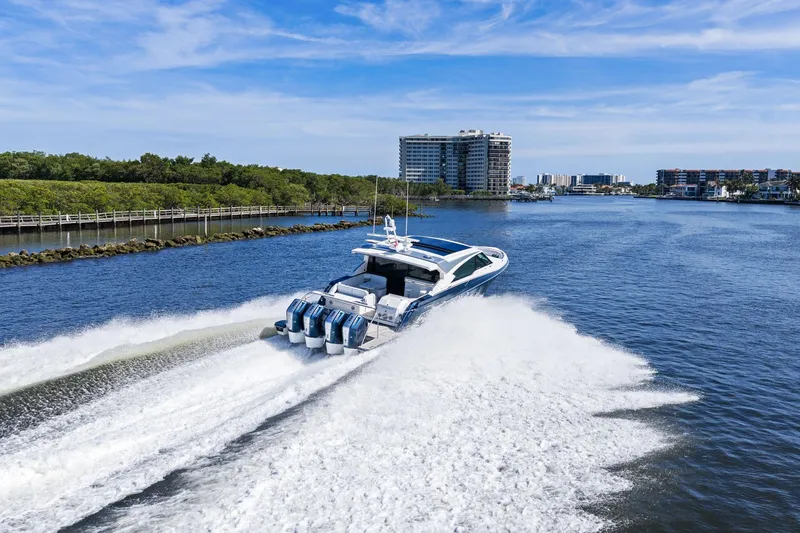 Slide: The Image of 2025 Formula 500 Super Sport Crossover speeding on a scenic waterway. - 74