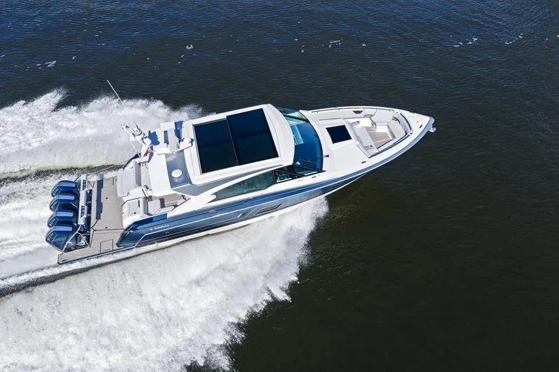 Slide: The Image of 2025 Formula 500 Super Sport Crossover cruising on open water, showcasing sleek design and powerful engines. - 75