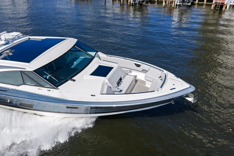 Slide: The Image of 2025 Formula 500 Super Sport Crossover cruising on water, showcasing sleek design and luxury features. - 76