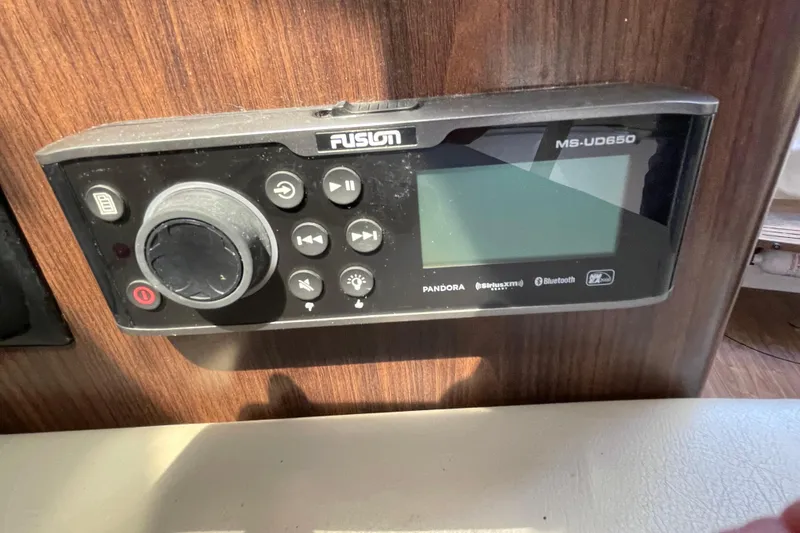 Slide: The Image of Fusion MS-UD650 stereo system on 2016 Regal 28 Express boat dashboard. - 20