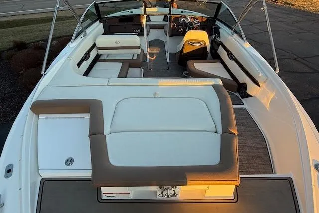 Slide: The Image of 2022 Cobalt CS22 boat interior with spacious seating and modern design. - 10