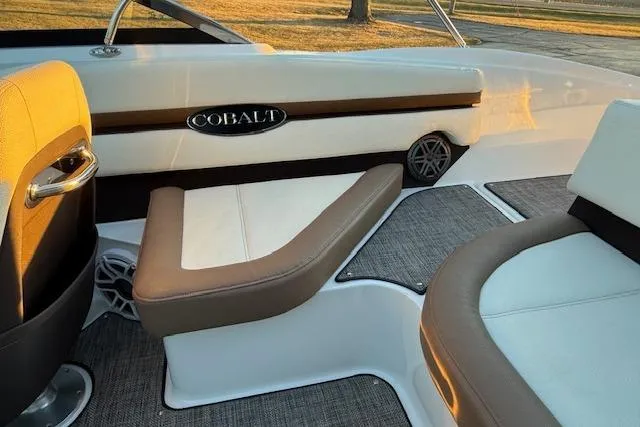 Slide: The Image of 2022 Cobalt CS22 boat interior with stylish seating and modern design. - 11