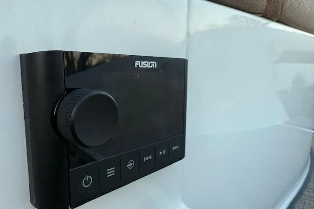 Slide: The Image of Fusion audio control panel on 2022 Cobalt CS22 boat dashboard. - 14
