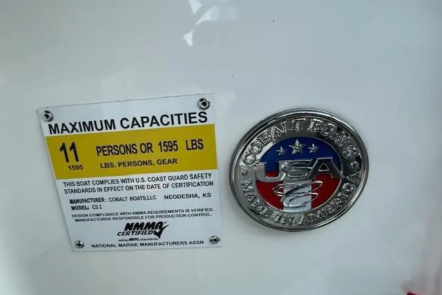 Slide: The Image of Cobalt CS22 2022 boat capacity label, 11 persons or 1595 lbs, NMMA certified. - 15