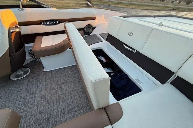 Slide: The Image of Interior of a 2022 Cobalt CS22 boat with seating and storage compartments. - 30