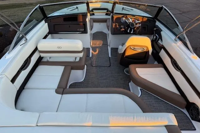 Slide: The Image of Interior of a 2022 Cobalt CS22 boat with luxurious seating and modern design. - 9