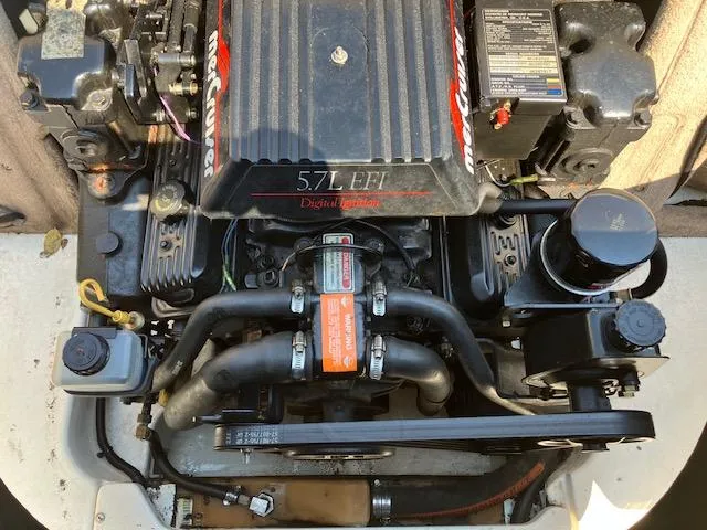 Slide: The Image of 1997 Sea Ray 190 Bow Rider 5.7L EFI MerCruiser engine. - 12