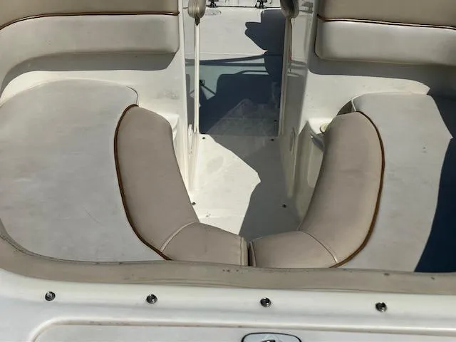 Slide: The Image of 1997 Sea Ray 190 Bow Rider interior seating area. - 4