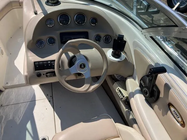 Slide: The Image of 1997 Sea Ray 190 Bow Rider boat dashboard and steering wheel. - 5