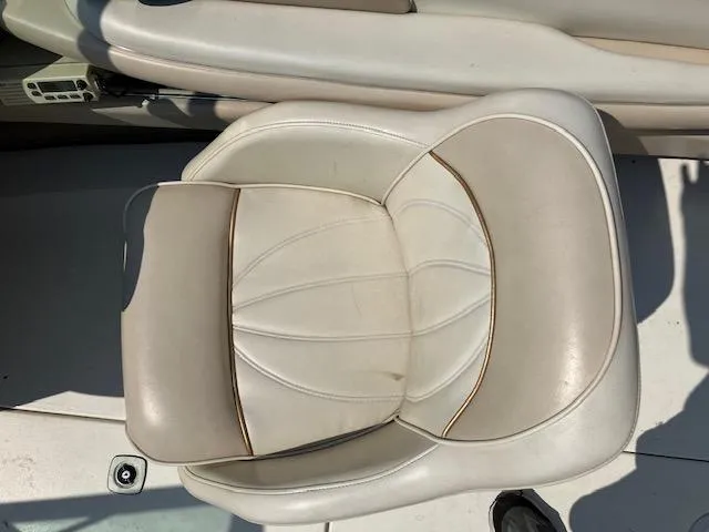 Slide: The Image of 1997 Sea Ray 190 Bow Rider boat seat, white leather upholstery. - 8
