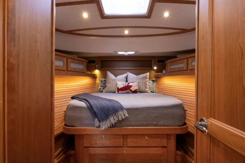 Slide: The Image of Luxurious cabin interior of 2026 Sabre 45 Salon Express yacht with cozy bedding. - 15