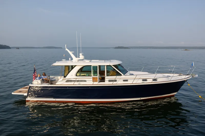 Slide: The Image of 2026 Sabre 45 Salon Express yacht cruising on calm waters. - 4