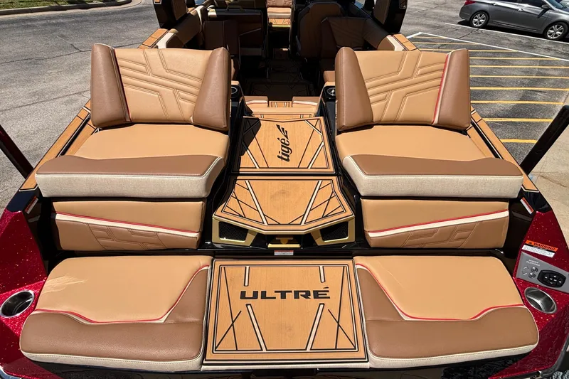 Slide: The Image of 2026 Tigé Ultré 25ZX boat interior with tan leather seating and stylish design. - 13
