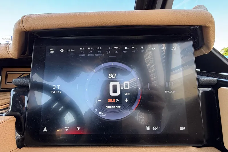 Slide: The Image of Touchscreen dashboard of 2026 Tigé Ultré 25ZX boat displaying speed and control settings. - 14