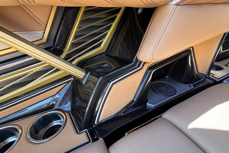 Slide: The Image of 2026 Tigé Ultré 25ZX interior detail with luxurious tan leather and sleek design elements. - 23