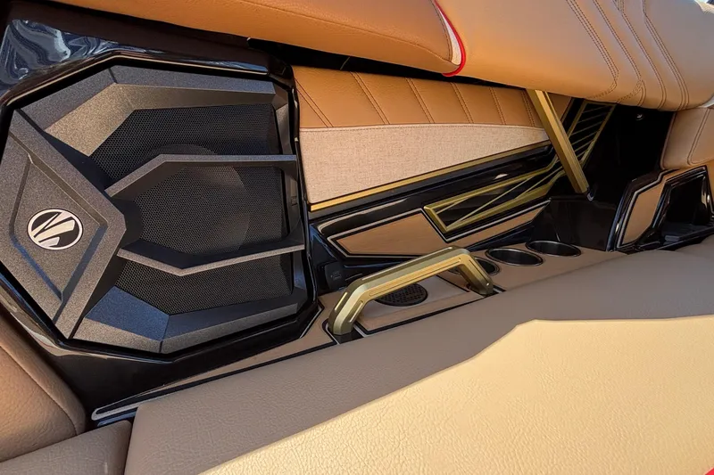 Slide: The Image of 2026 Tigé Ultré 25ZX interior with premium speaker and luxurious seating. - 24