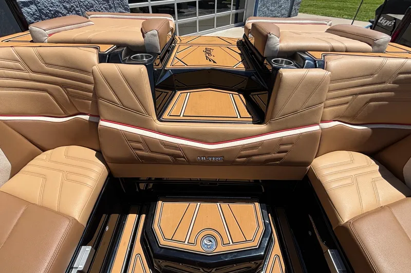 Slide: The Image of Luxurious interior of 2026 Tigé Ultré 25ZX boat with tan leather seating. - 30