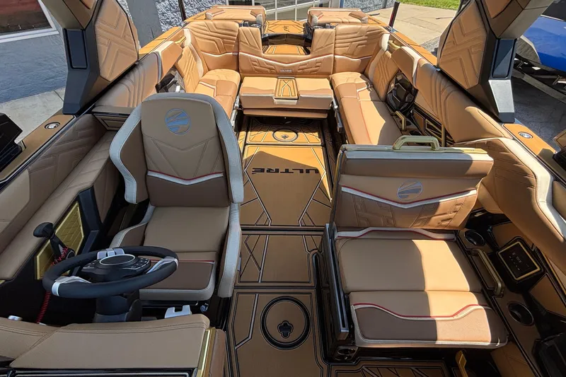 Slide: The Image of 2026 Tigé Ultré 25ZX boat interior with luxurious tan seating and modern design. - 41