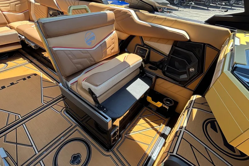 Slide: The Image of Luxurious interior of 2026 Tigé Ultré 25ZX boat with tan seating and modern design. - 45