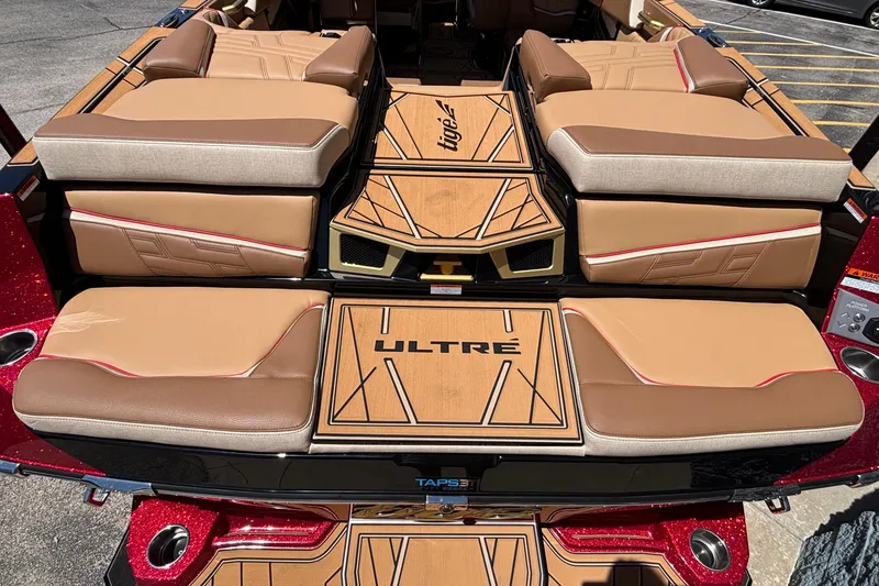 Slide: The Image of 2026 Tigé Ultré 25ZX boat interior with luxurious tan seating and stylish design. - 5