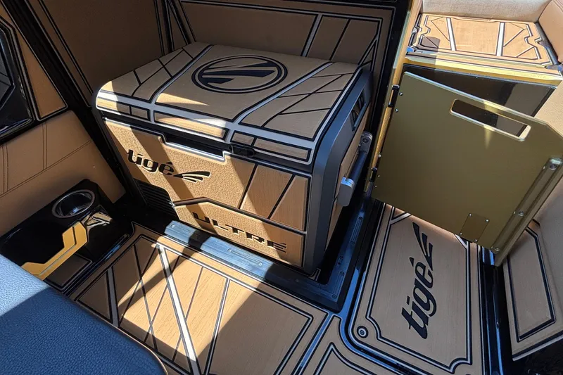 Slide: The Image of 2026 Tigé Ultré 25ZX interior with stylish design and branded flooring. - 54