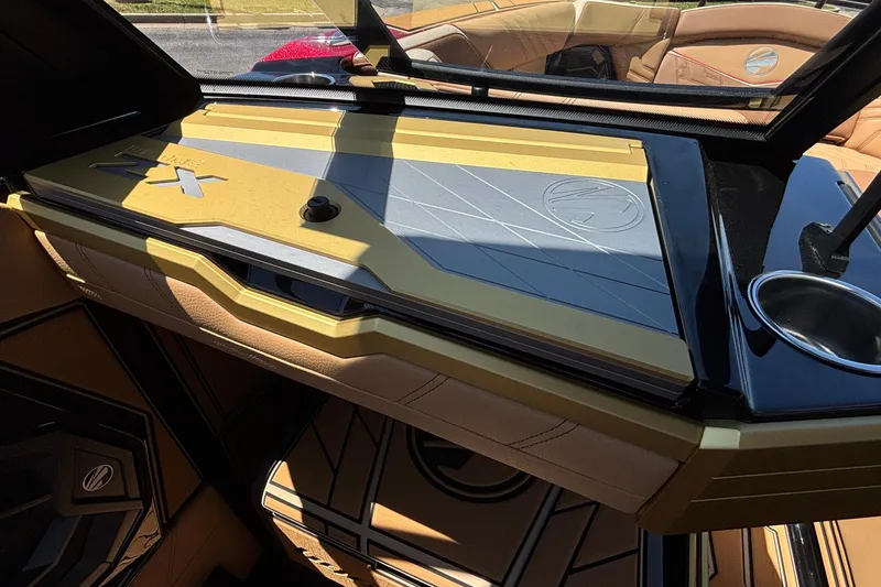 Slide: The Image of 2026 Tigé Ultré 25ZX boat interior with sleek design and luxurious seating. - 56