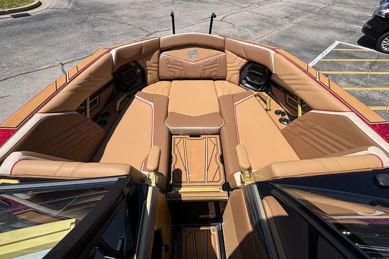 Slide: The Image of Luxurious interior of 2026 Tigé Ultré 25ZX boat with tan leather seating. - 58
