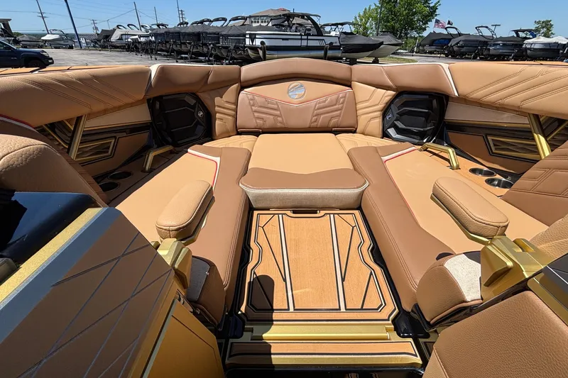 Slide: The Image of Luxurious interior of 2026 Tigé Ultré 25ZX boat with tan leather seating. - 60