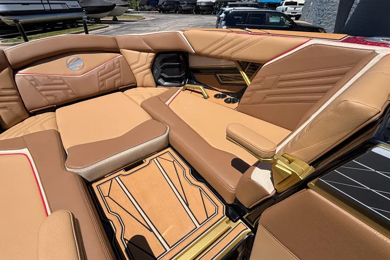 Slide: The Image of Luxurious interior of 2026 Tigé Ultré 25ZX boat with tan leather seating and stylish design. - 61