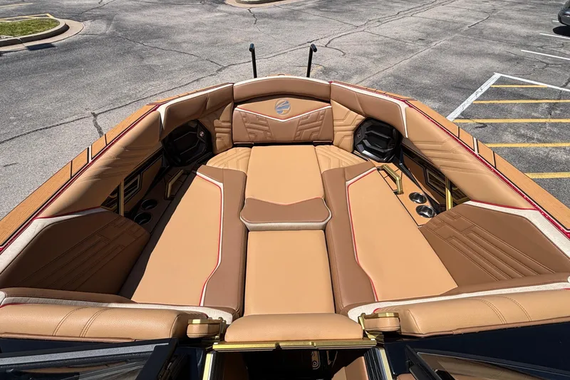 Slide: The Image of Luxurious interior of 2026 Tigé Ultré 25ZX boat with tan leather seating. - 67
