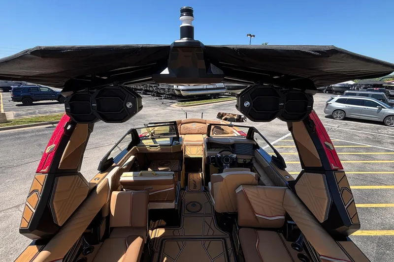 Slide: The Image of 2026 Tigé Ultré 25ZX boat interior with luxury seating and advanced audio system. - 70