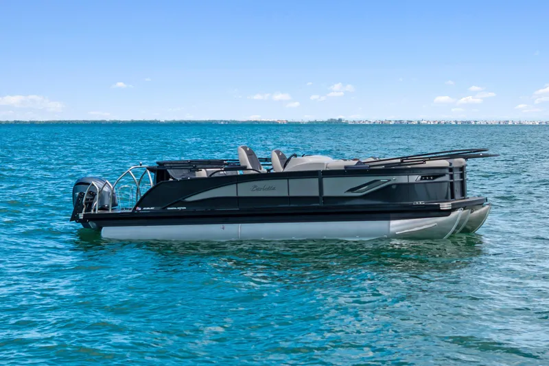 The Image of 2025 Barletta Corsa 23UC pontoon boat on open water, sleek design, sunny day. - 1