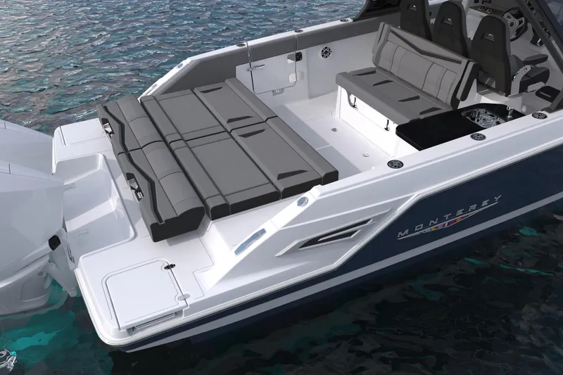 Slide: The Image of 2027 Monterey boat with sleek seating and modern design on calm water. - 4