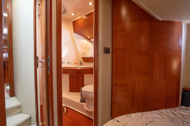 Slide: The Image of Luxurious 2008 Azimut Fly 50 yacht interior with elegant wood finishes and modern bathroom. - 13
