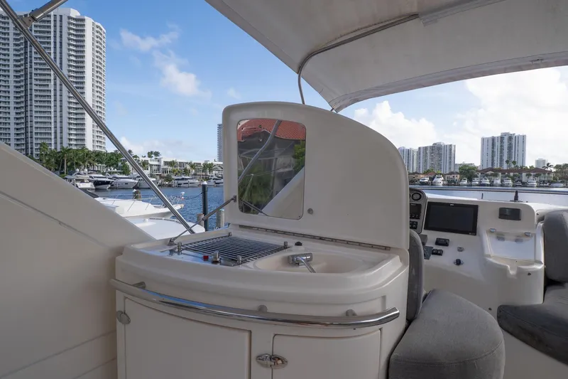 Slide: The Image of Flybridge of 2008 Azimut Fly 50 yacht with cityscape and marina view. - 21