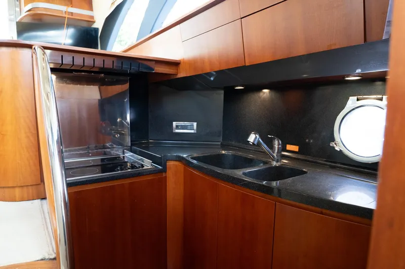 Slide: The Image of Luxurious kitchen interior of 2008 Azimut Fly 50 yacht with modern amenities. - 8