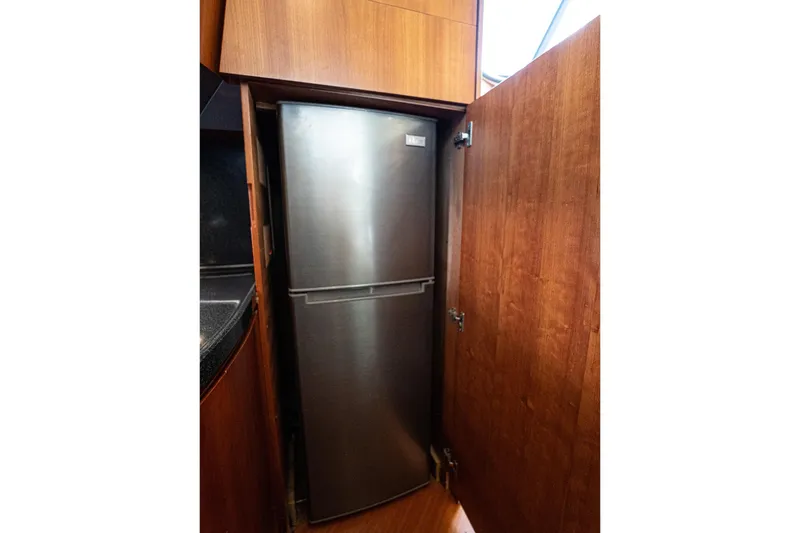 Slide: The Image of Stainless steel refrigerator in 2008 Azimut Fly 50 yacht kitchen. - 9