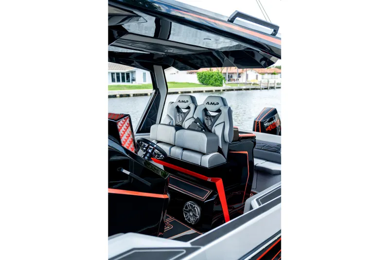 Slide: The Image of Luxurious interior of 2026 AMP 333 boat with modern seating and sleek design. - 10