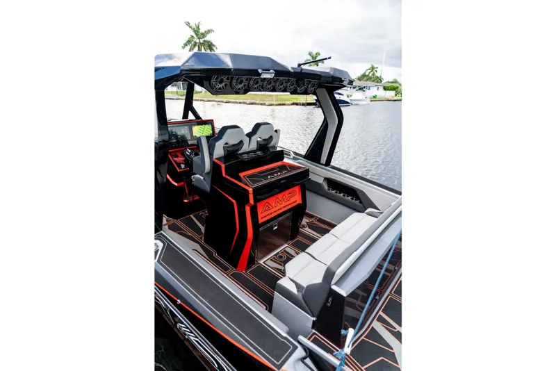 Slide: The Image of Modern AMP 333 boat interior, 2026 model, featuring sleek design and advanced navigation technology. - 4